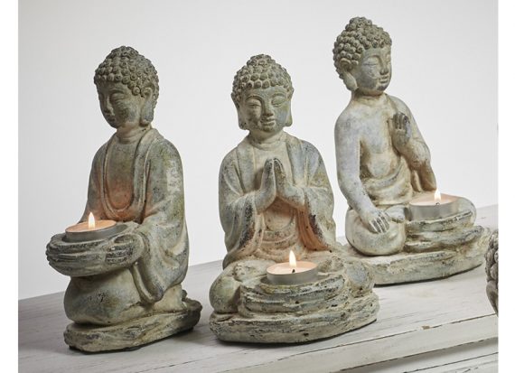buda-piedra-sentado-vela